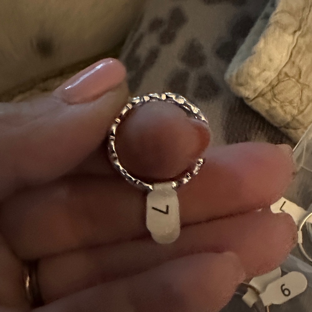 Elegant Silver Braided Eternity Ring